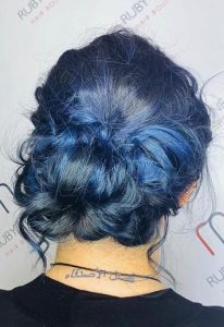 blue hair colour messy undone bun top hair salon in farnham